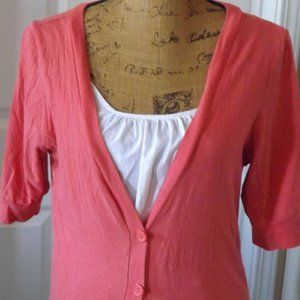 Light peach colored cardigan